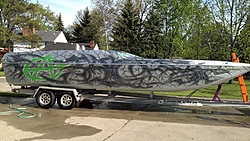 sneak peek at new paint-wet-boat.jpg