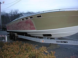 Repainting my boat Project (With Pictures)-boat-starbord-half-sanded.jpg