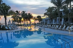 FMO charity auction item # 1 - Seats for 2 for Hawks Cay Resort  weekend in the Keys-resort-pool-sunrise.jpg