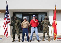 Santa Comes early to needy kids-marinesflags_haggin.jpg