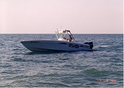Anybody notice the new trend - CC Outboards?-scarab-onwater1.jpg