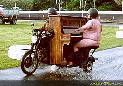 New hauler for you FL boys........ :)-nude-guy-playing-piano-driving-bike.jpg