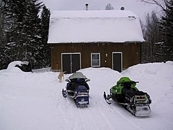 Sledders-cabin-snow-w-sleds.jpg