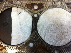 What is wrong with these head gaskets-photo-2gasket.jpg