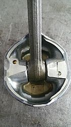 Card in spokes noise from back of engine-piston-damage.jpg