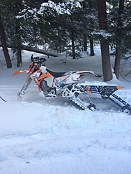 Snowmobiling 2015-frozenmotowoods.jpg