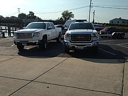 Whos towing larger boat with Lifted Truck???-gmc.jpg